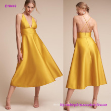 a Chic Update to a Classic A-Line Cut with Satin Design Ultra-Clean Lines and a Plunging Halter Neckline Balances a High Fitted Waist Evening Dress